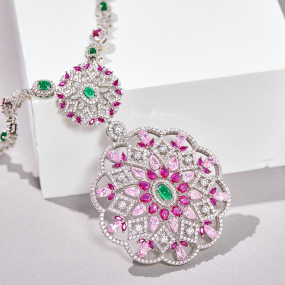 Golden Bloom Hollow Pear-Shaped Floral Pendant Necklace - Image 3